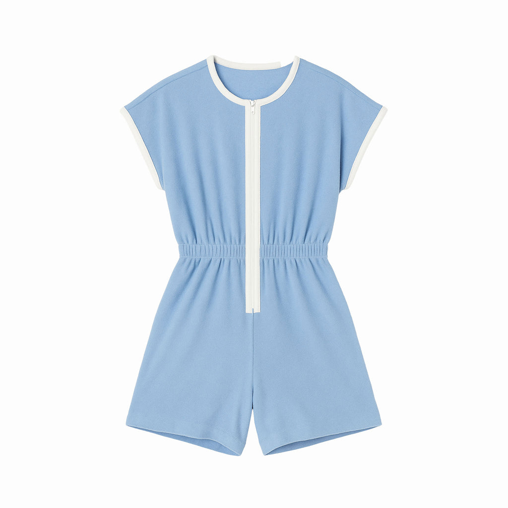 Light blue romper with white trim on a white background
